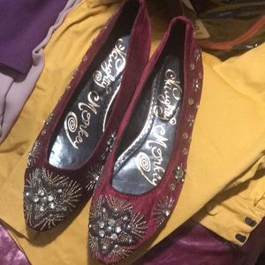 Beautiful Burgundy purplish flats with embellishment.